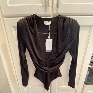 Brand new Lovers and Friends black bodysuit. Never worn!